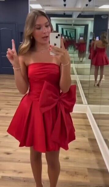 Strapless Taffeta Homecoming Dress with Pleated Bodice and Bow on Wais DressesTailor Strapless Taffeta Homecoming Dress with Pleated Bodice and Bow on Wais DressesTailor
